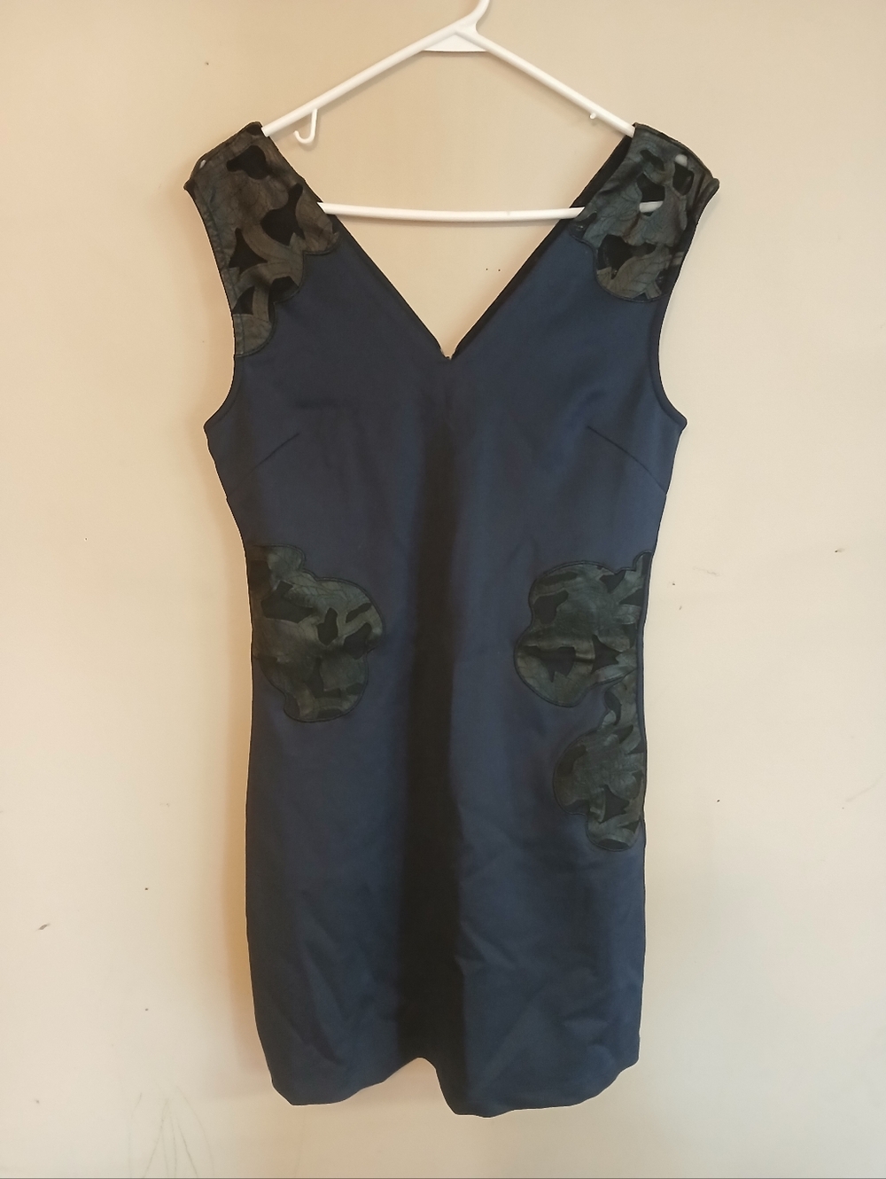 Navy V-Neck Sleeveless Dress with Green Appliqué Accents